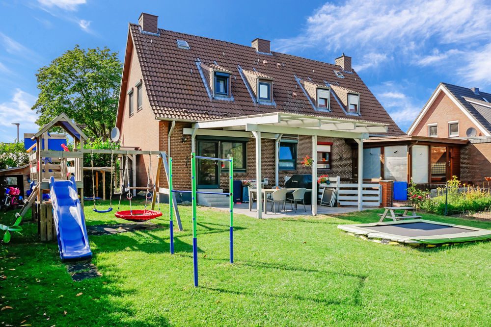Immobilienangebot - Flintbek - Alle - Kinderparadies in Flintbek! Gepflegte DHH mit tollem Garten für die kleine Familie