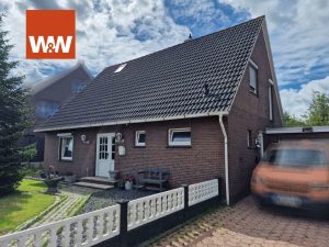 Immobilienangebot - Südbrookmerland / Moordorf - Alle - Zentrumsnahes Einfamilienhaus mit Garage und großem Garten
