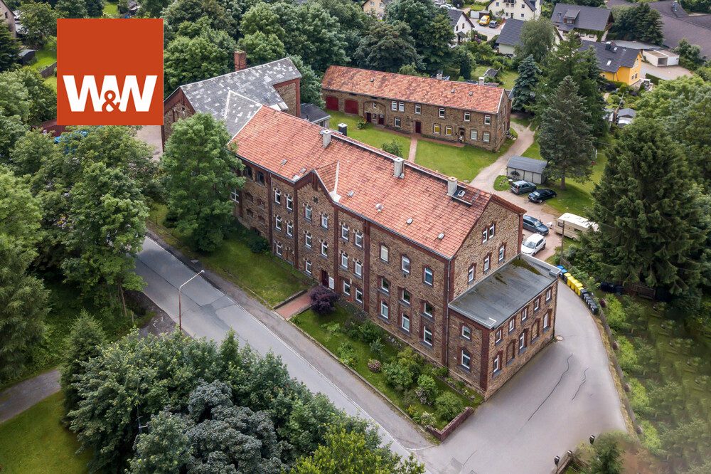 Immobilienangebot - Scheibenberg - Alle - 2 Mehrfamilienhäuser im Erzgebirge mit 8602 m² baureifes Grundstück (Zentrumnah)