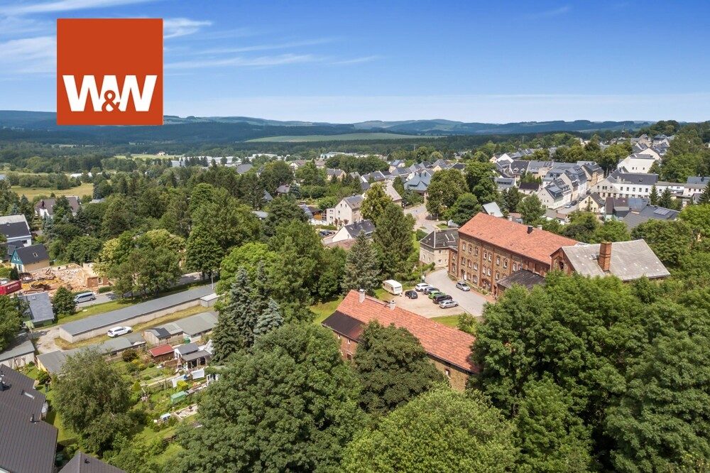 Immobilienangebot - Scheibenberg - Alle - 2 Mehrfamilienhäuser im Erzgebirge mit 8602 m² baureifes Grundstück (Zentrumnah)