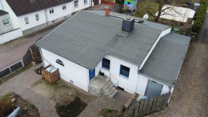 Immobilienangebot - Osternienburger Land - Alle - Modernisiertes Einfamilienhaus mit großem Grundstück, Pool & Keller in ruhiger Lage