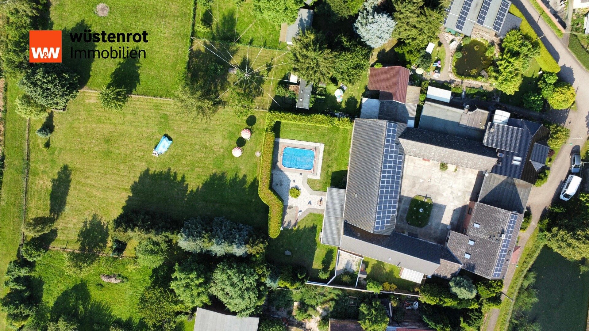 Immobilienangebot - Wittenberg-Berkau - Alle - Wohnoase mit Einliegerwohnung und Pferdehof. Rentable Einnahmen von ca. 1000 € mtl. durch PV-Anlage!