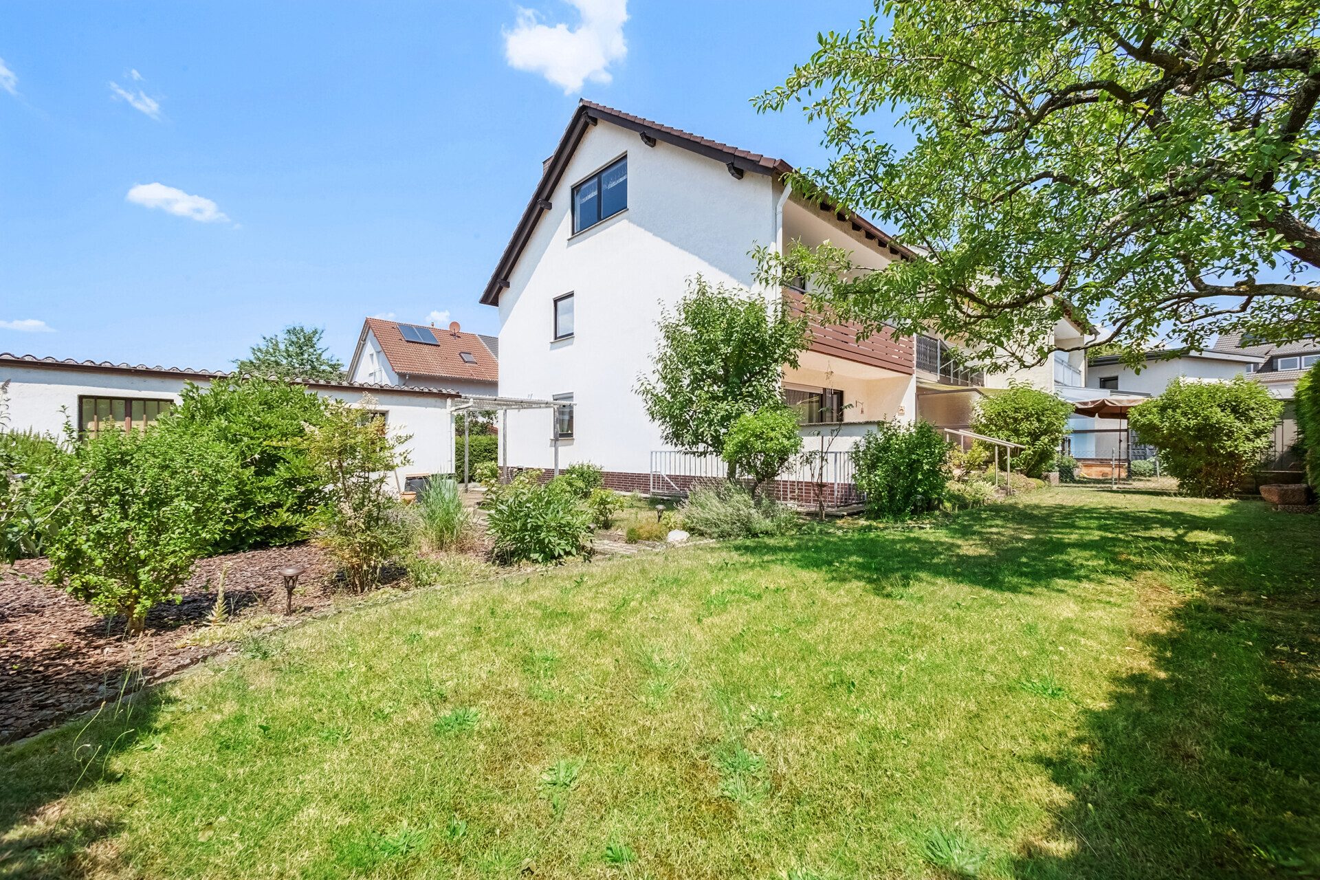 Immobilienangebot - Kleinostheim - Alle - Wohnen, wo andere Urlaub machen – Ihr Zuhause mit Mainblick und Gartenidylle