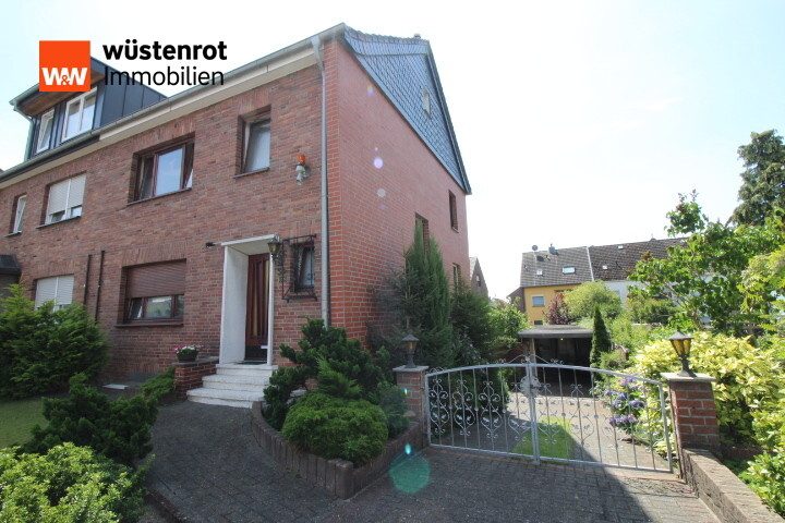 Immobilienangebot - Moers - Scherpenberg - Alle - Familienfreundliche Doppelhaushälfte mit viel Potenzial - 2 Garagen und schönem Garten!