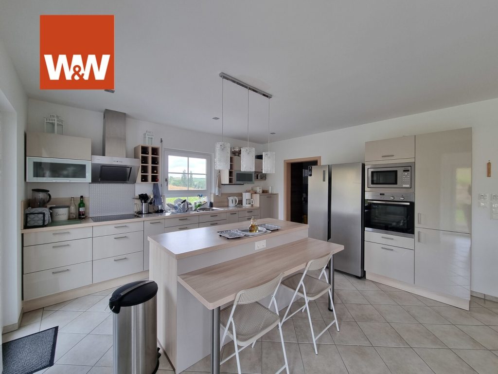 Immobilienangebot - Seinsheim / Wässerndorf - Alle - Modernes Einfamilienhaus mit Einliegerwohnung, Doppelgarage und großem Garten