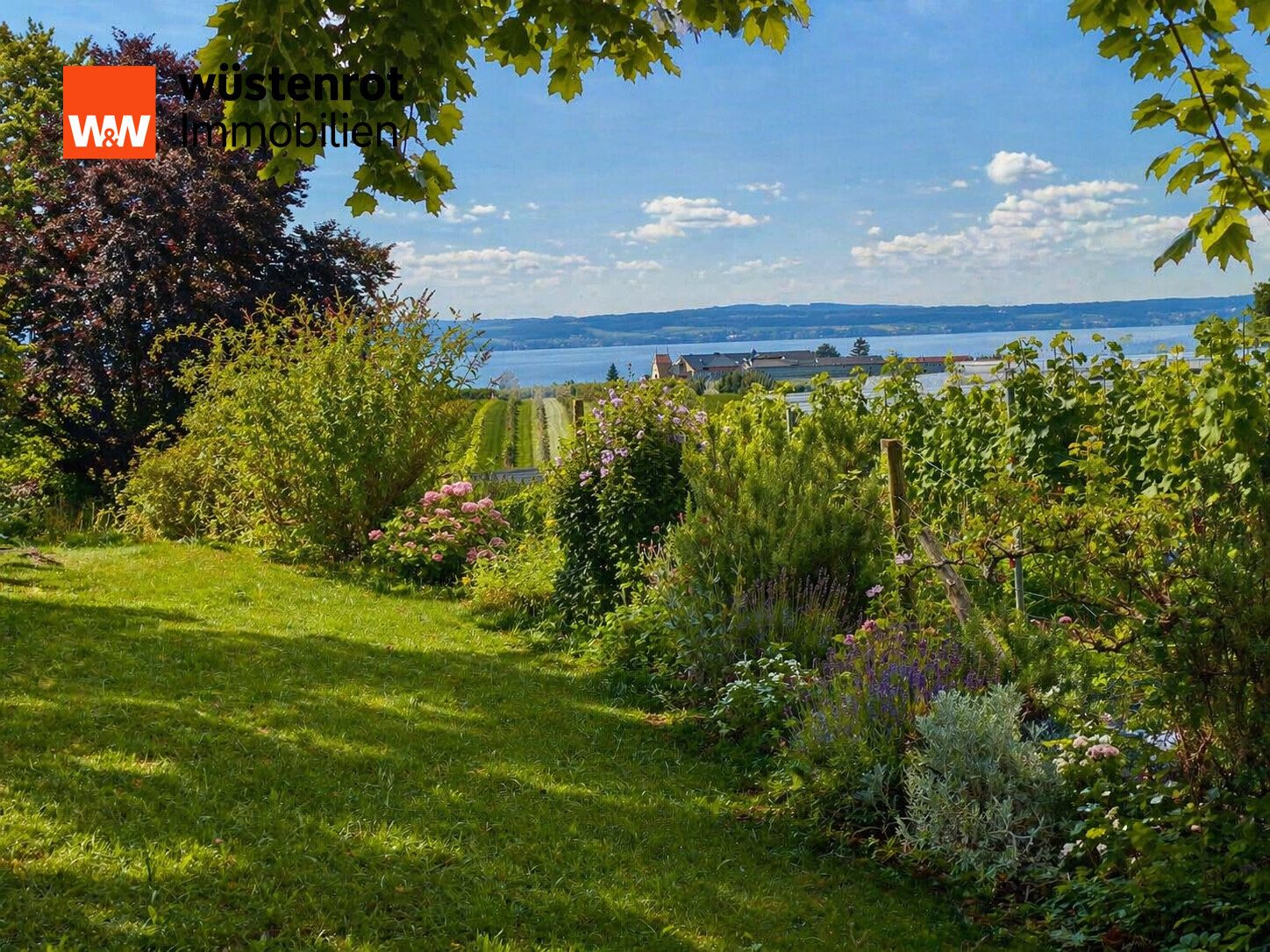 Immobilienangebot - Hagnau am Bodensee - Alle - Klein, fein, mein: charmante Erdgeschosswohnung mit Bodensee- und Alpenblick auf Traumgrundstück!