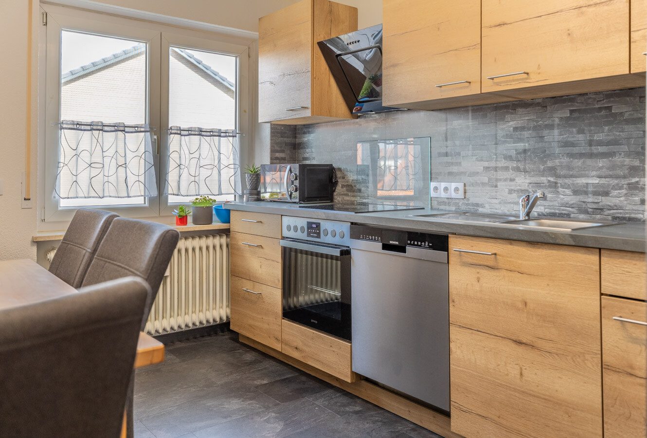 Immobilienangebot - Hofstetten / Hagenheim - Alle - Modernisiert und gepflegt - Attraktive Etagenwohnung mit Balkon