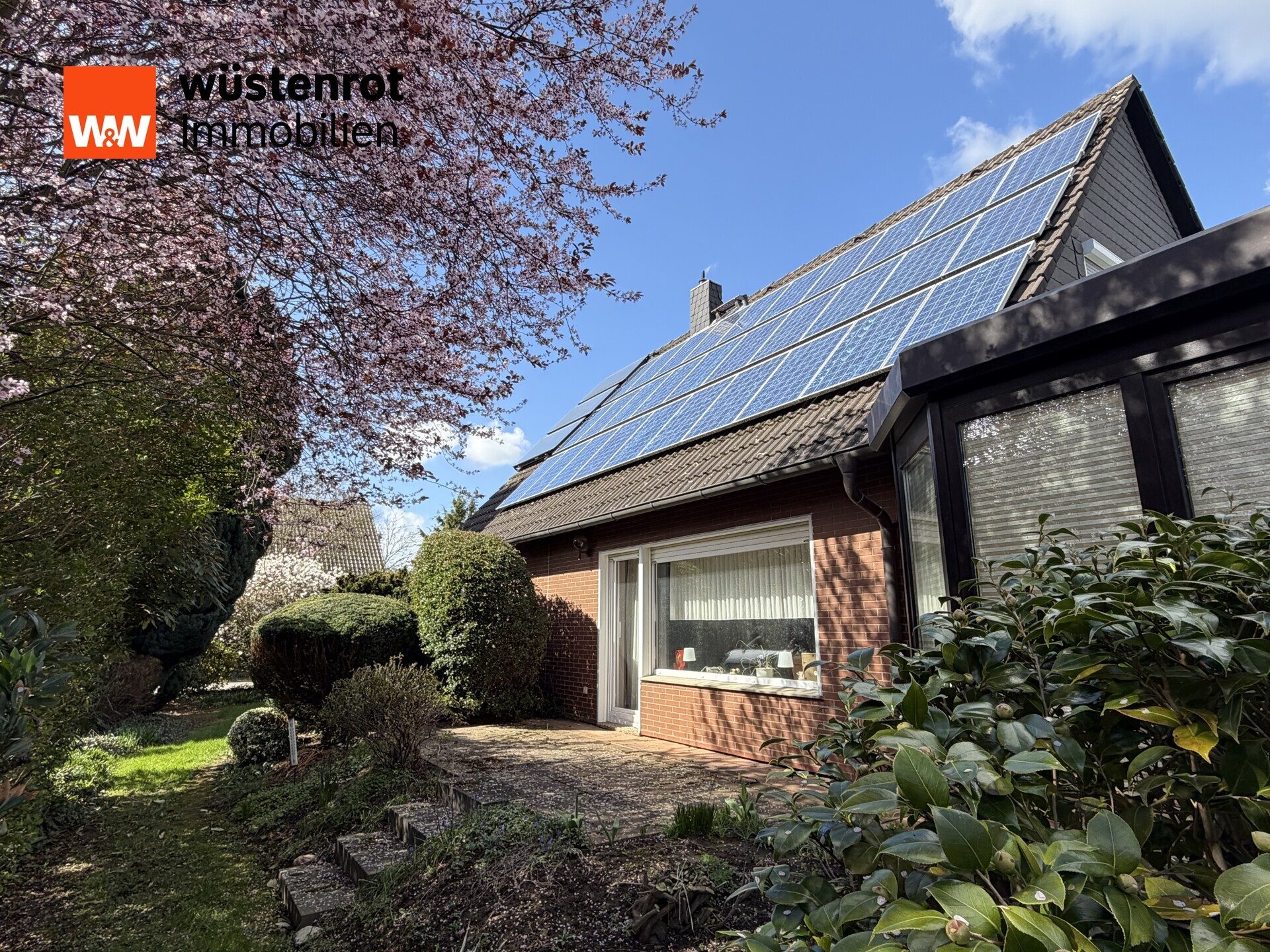 Immobilienangebot - Minden - Alle - Idyllisches Einfamilienhaus mit Wintergarten und gepflegtem, großem Garten mit zwei Terrassen