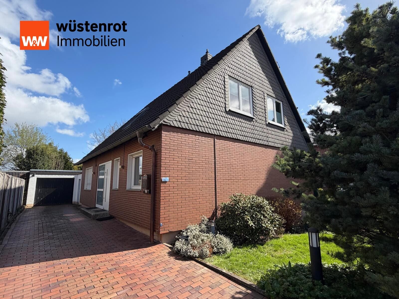 Immobilienangebot - Minden - Alle - Idyllisches Einfamilienhaus mit Wintergarten und gepflegtem, großem Garten mit zwei Terrassen
