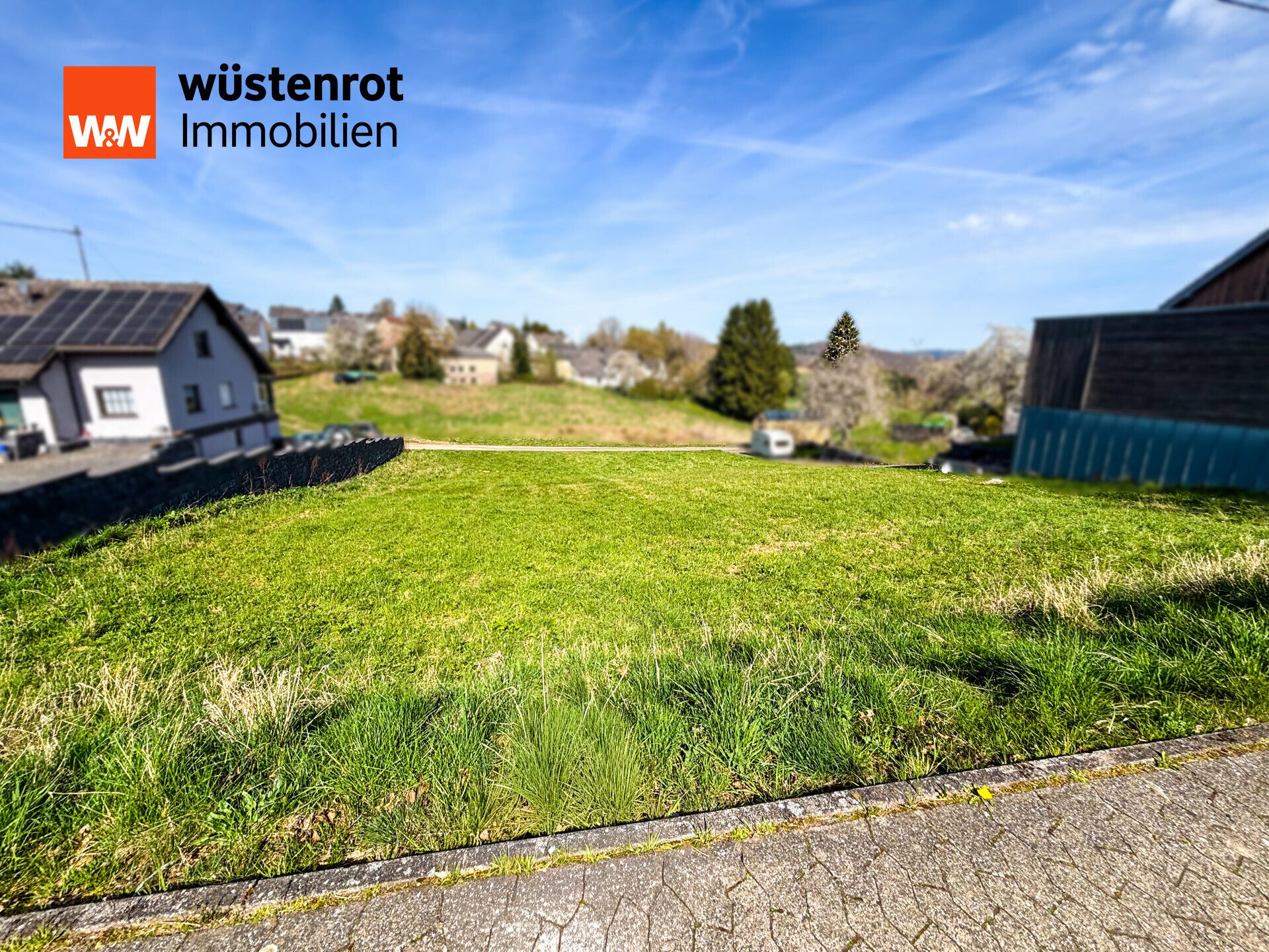 Hinteransicht Immobilienangebot - Hauroth - Alle - Großzügiges Grundstück in idyllischer Lage – ideal für Ihr Eigenheim