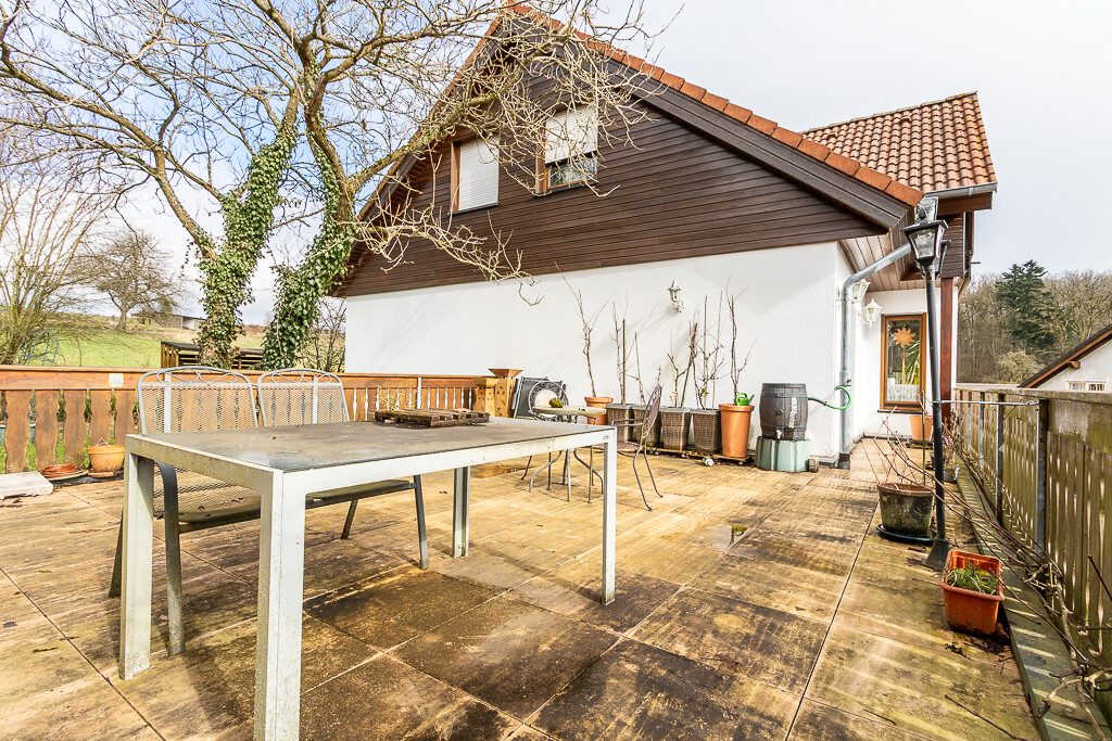 Immobilienangebot - Üdersdorf - Alle - Einfamilienhaus mit vermieteter Einliegerwohnung, wunderschönem Garten, großer Terrasse und Garage.