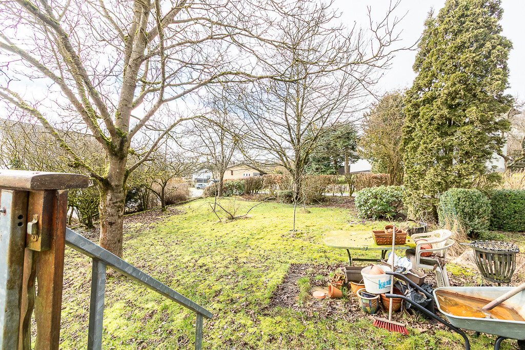 Immobilienangebot - Üdersdorf - Alle - Einfamilienhaus mit vermieteter Einliegerwohnung, wunderschönem Garten, großer Terrasse und Garage.