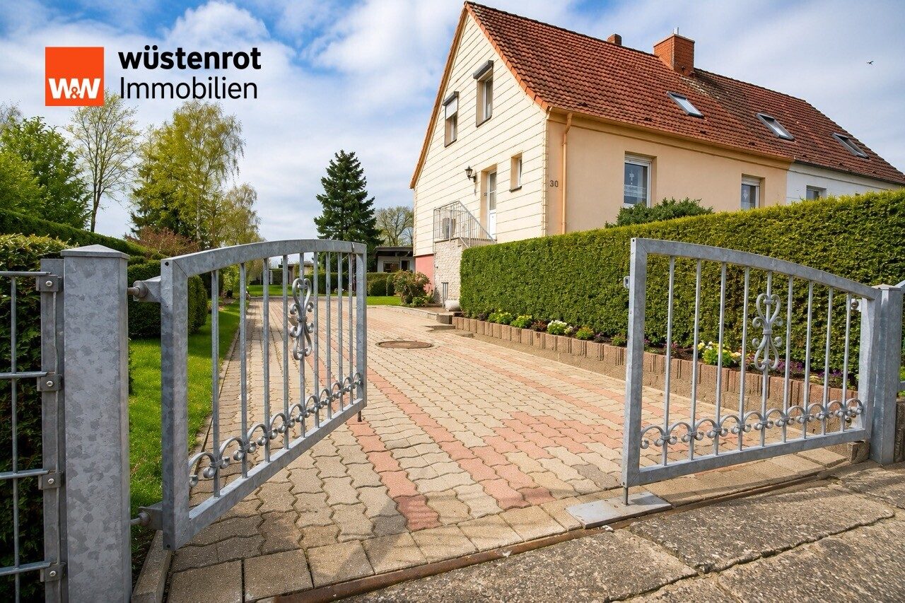 Immobilienangebot - Richtenberg - Alle - Wohnhaus mit zusätzlichem Baugrundstück – gepflegte DHH auf 1.989 m² Grundstück in Richtenberg