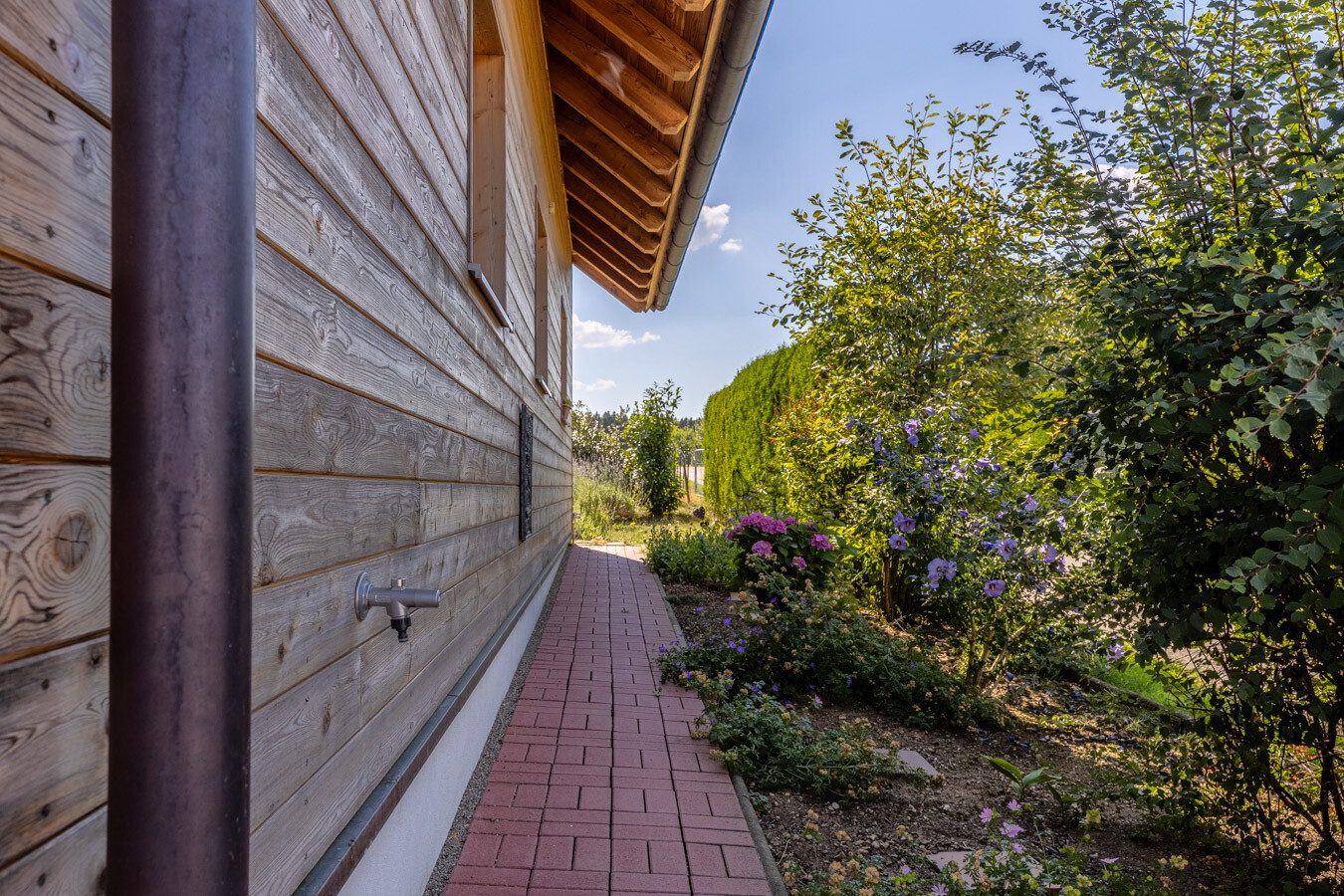 Immobilienangebot - Waltenhausen / Weiler - Alle - Natürlich wohnen, idyllisch leben – nachhaltiges Familienhaus in ruhiger Ortsrandlage