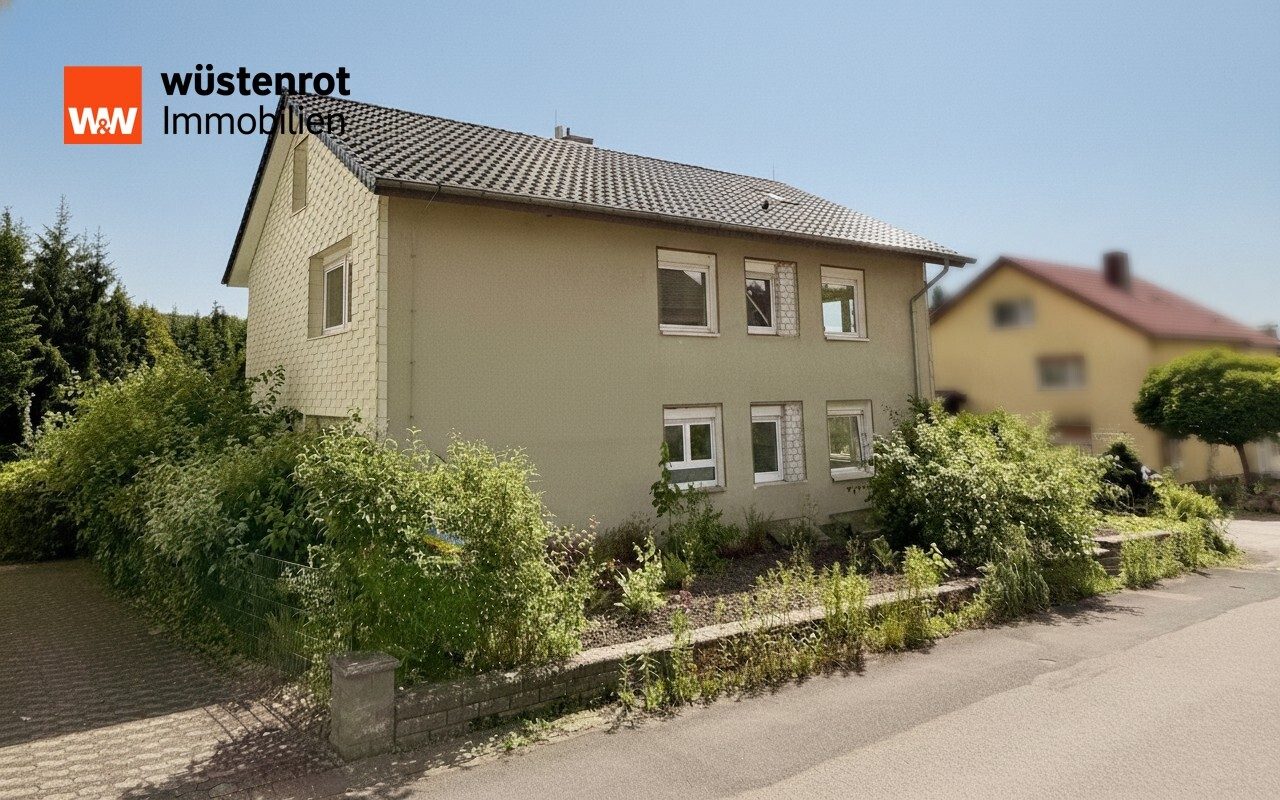 Immobilienangebot - Dörentrup / Schwelentrup - Alle - Vielseitiges Zweifamilienhaus mit zwei Wohneinheiten und Doppelgarage in Dörentrup-Schwelentrup