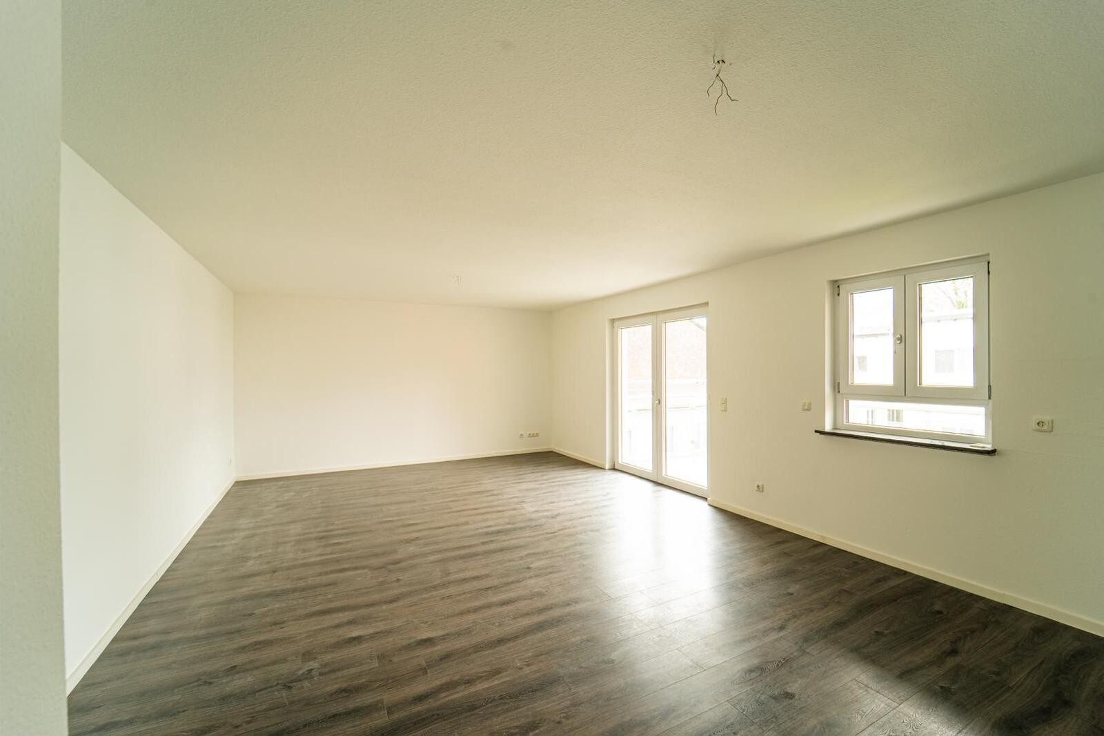 Immobilienangebot - Offenbach - Alle - Ihr neues Zuhause: 3-Zimmer-Wohnung im Erdgeschoss mit Balkon im Kfw-70 Haus in Offenbach