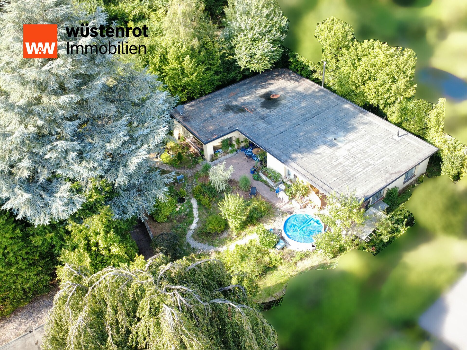 Immobilienangebot - Aerzen / Reinerbeck - Alle - Bungalow in exponierter Aussichtslage, großzügigem Grundstück und Doppelgarage
