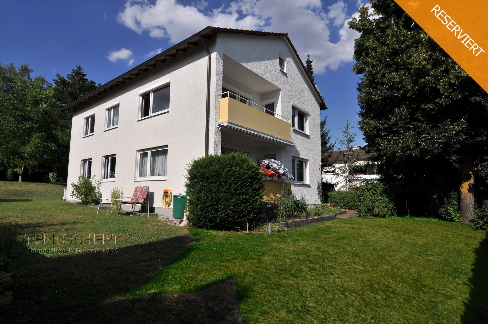 Tentschert Immobilien GmbH & Co. KG - Immobilienangebot - 89075 Ulm - Eselsberg - Zweifamilienhaus - Gepflegtes Zweifamilienhaus mit viel Platz für Ihre Familie!