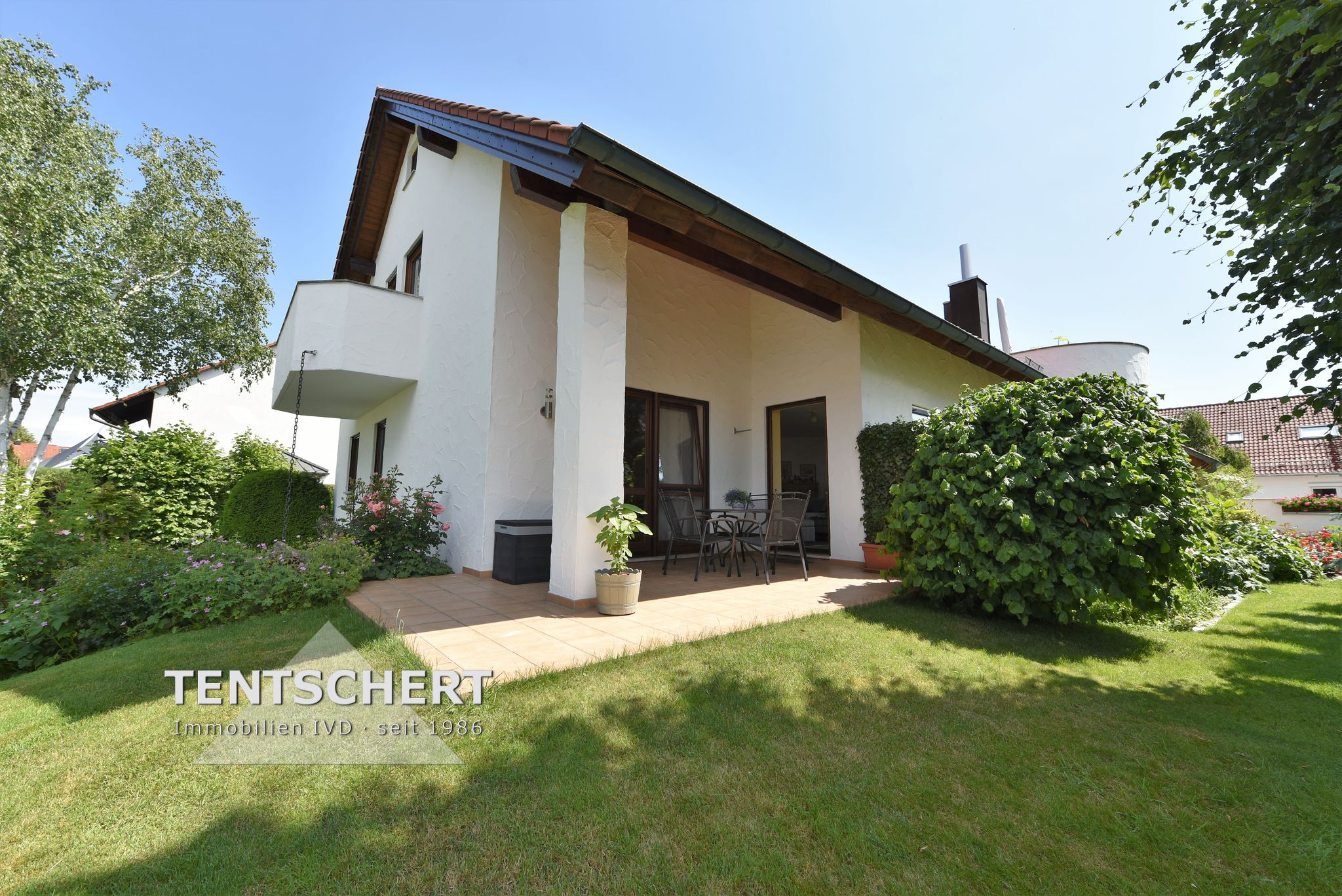 Tentschert Immobilien GmbH & Co. KG - Immobilienangebot - 89231 Neu-Ulm - Ludwigsfeld - Einfamilienhaus mit Einliegerwohnung - Großzügiges und gepflegtes Wohnhaus in schöner Ortsrandlage