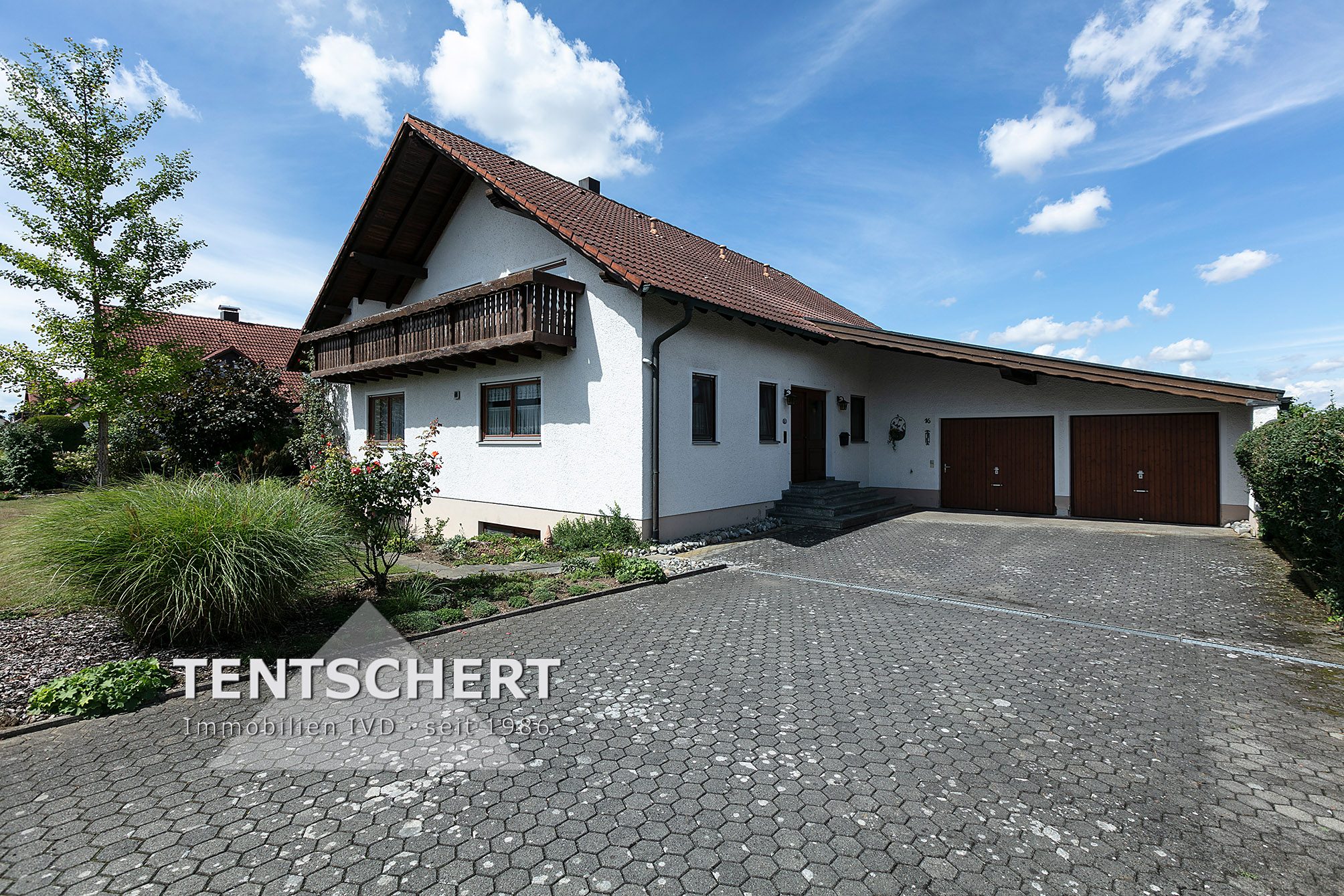 Tentschert Immobilien GmbH & Co. KG - Immobilienangebot - 88480 Achstetten - Landkreis Biberach - Einfamilienhaus - Einfamilienhaus inkl. Doppelgarage mit schönem Ausblick