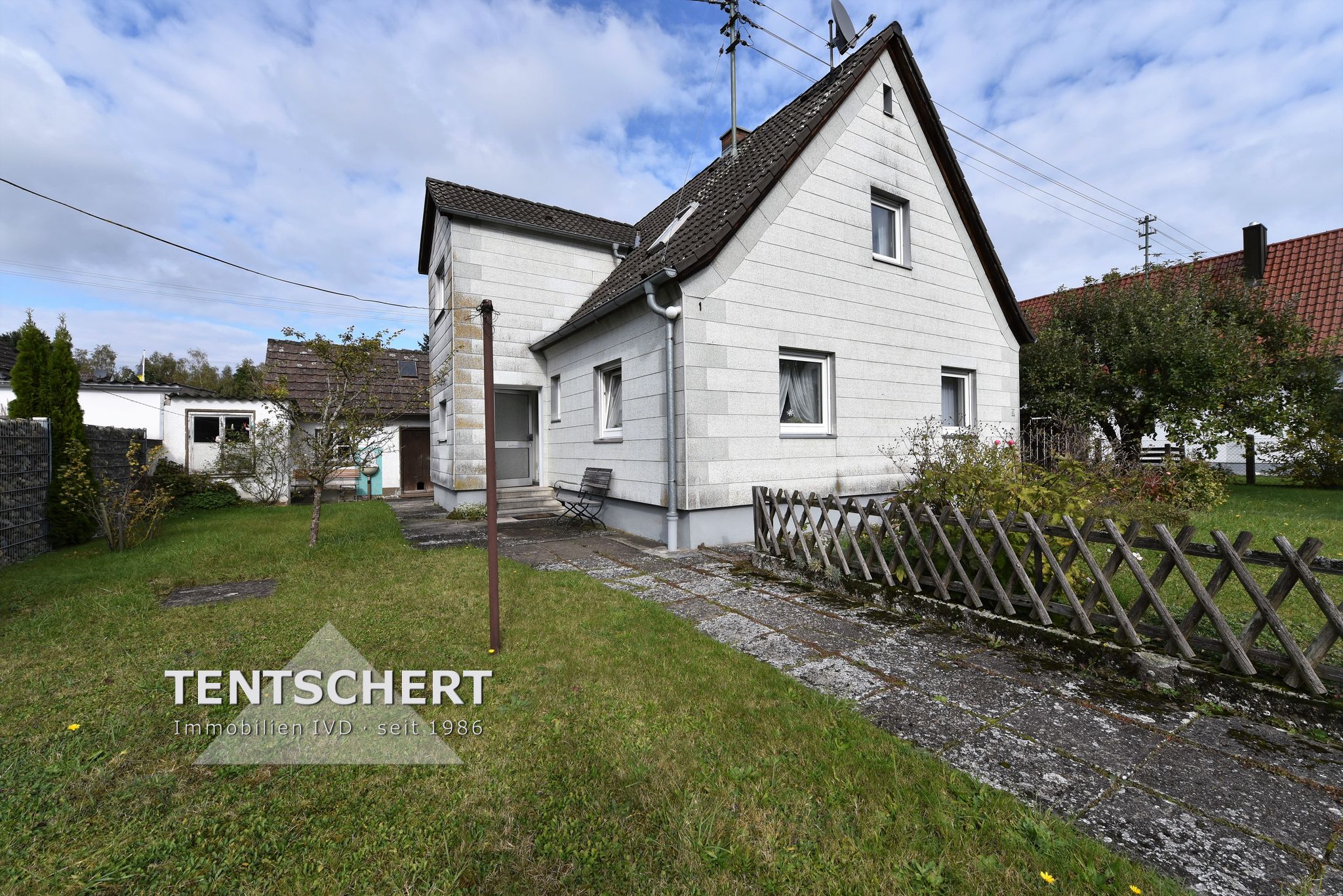 Tentschert Immobilien GmbH & Co. KG - Immobilienangebot - 89278 Nersingen - Nersingen - Einfamilienhaus - Siedlungshäuschen auf schönem Grundstück wartet auf liebevolle Modernisierung