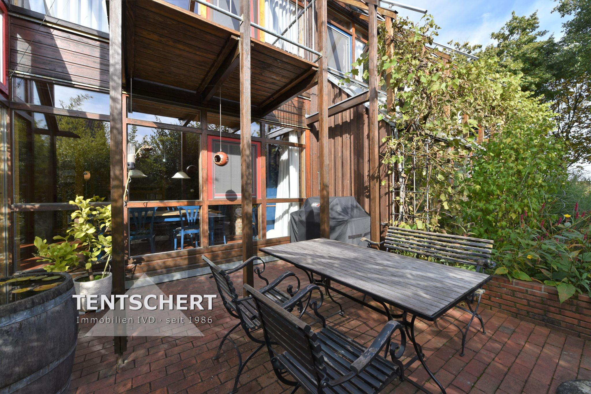 Tentschert Immobilien GmbH & Co. KG - Immobilienangebot - 89079 Ulm - Gögglingen - Reihenmittelhaus - Außergewöhnliche Architektur im Grünen - Provisionsfrei!