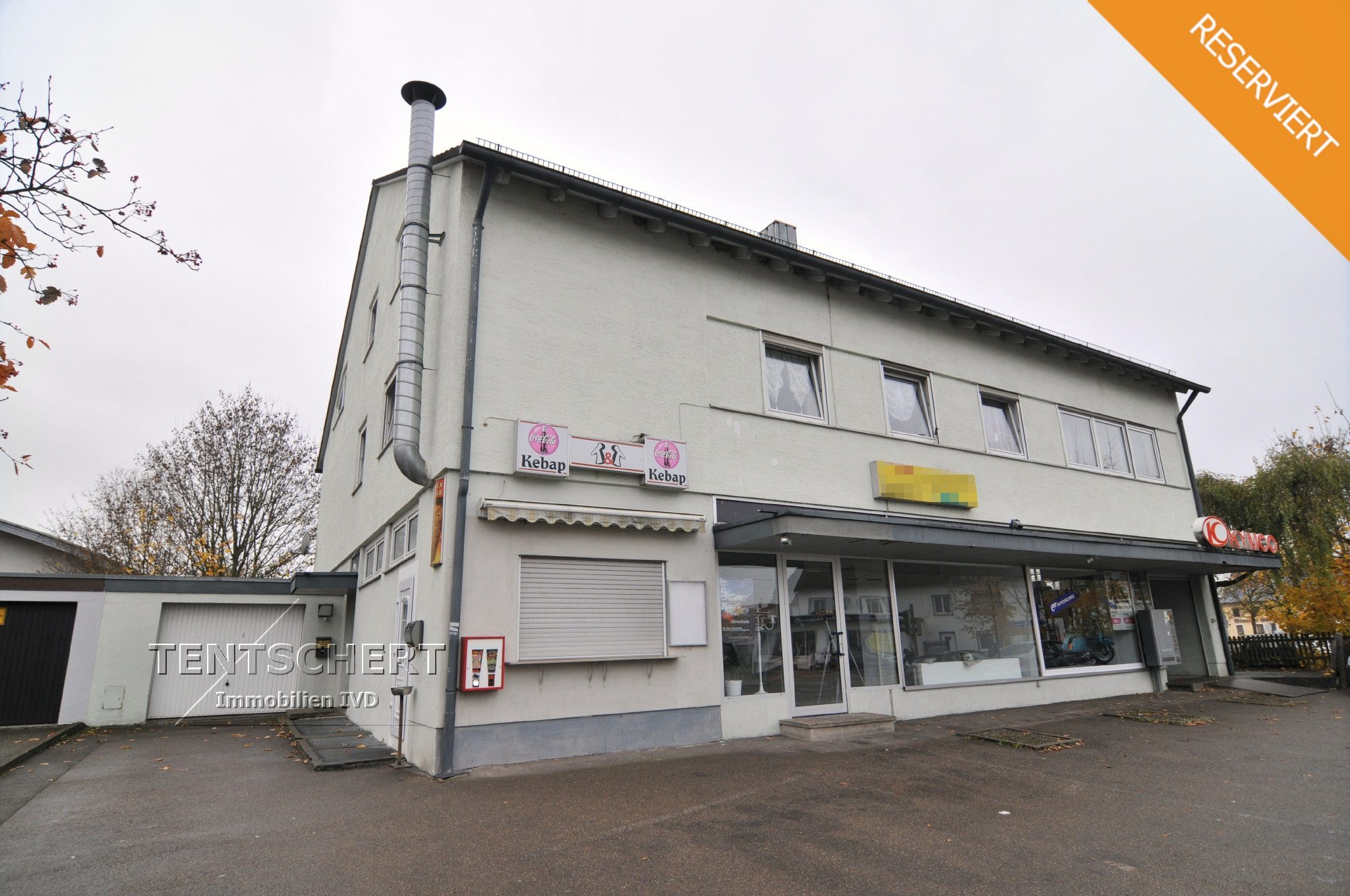 Tentschert Immobilien GmbH & Co. KG - Immobilienangebot - 89278 Nersingen - Nersingen - Mehrfamilienhaus - Wohn-und Geschäftshaus, zentrale Lage, gepflegt, Garage, Stellplätze