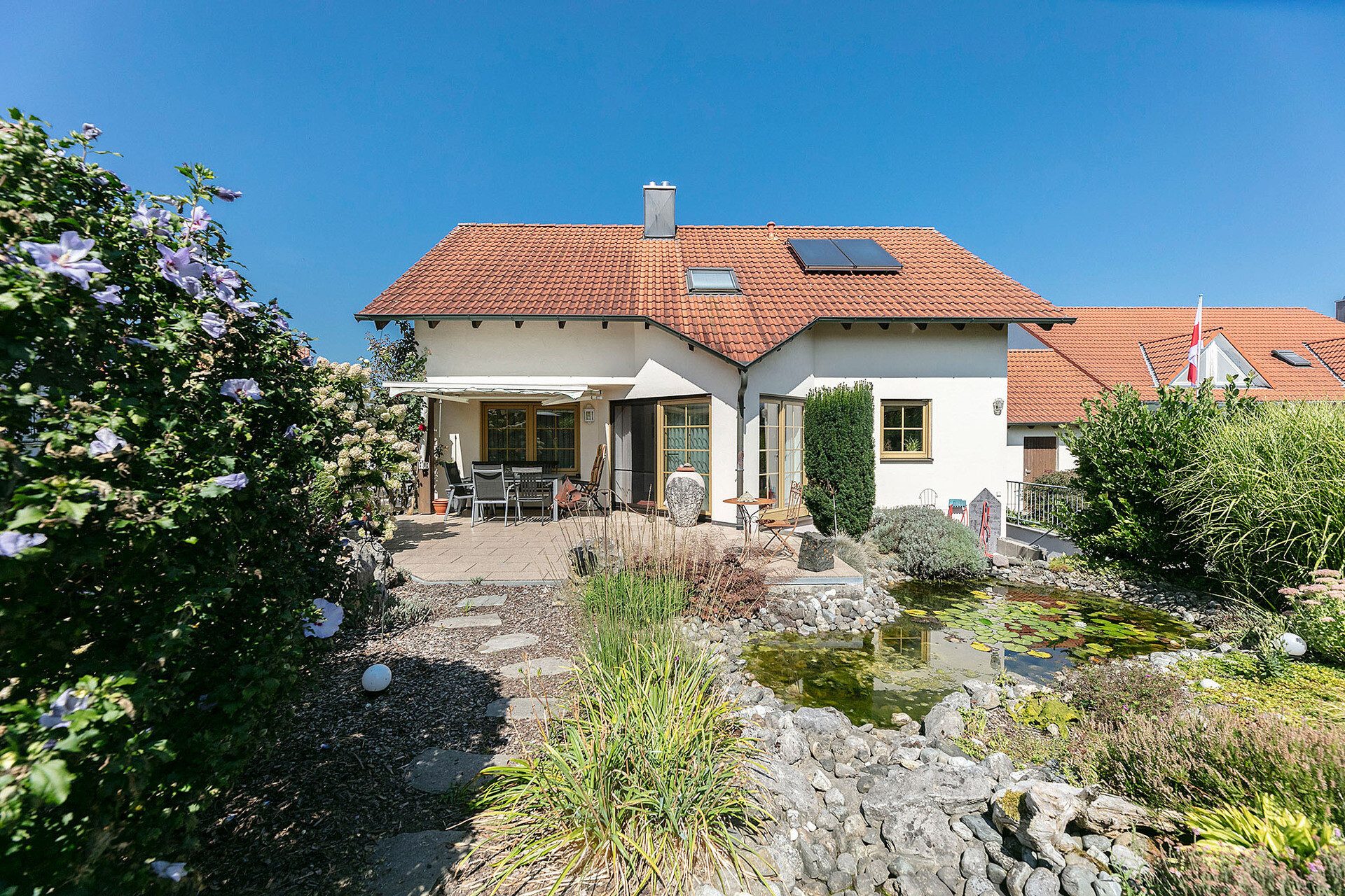 Immobilienangebot - Hüttisheim - Alle - Charmantes Einfamilienhaus mit traumhaftem Garten