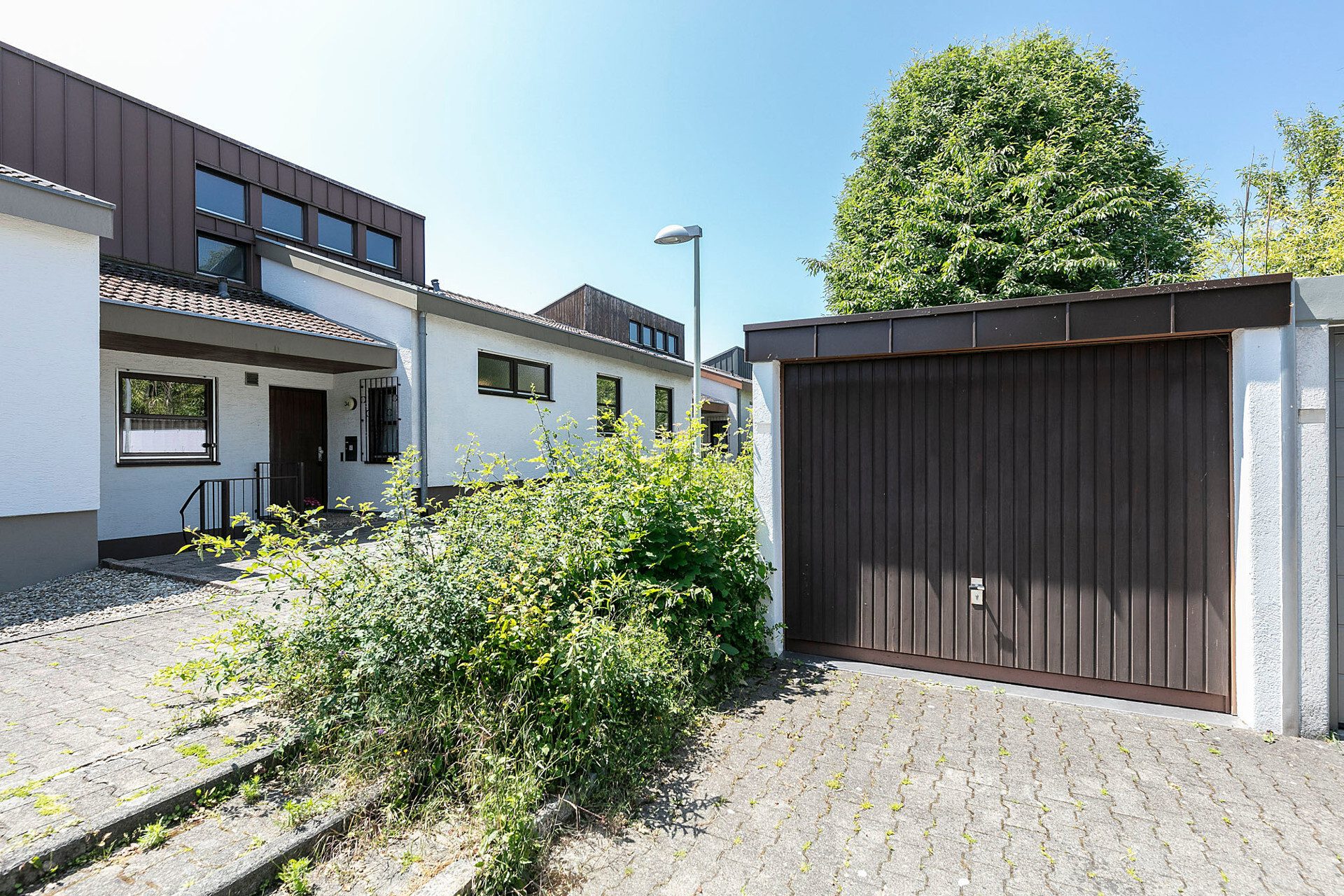 Immobilienangebot - Ulm - Alle - Besonderes Split-Level-Kettenhaus mit Garten in Wiblingen
