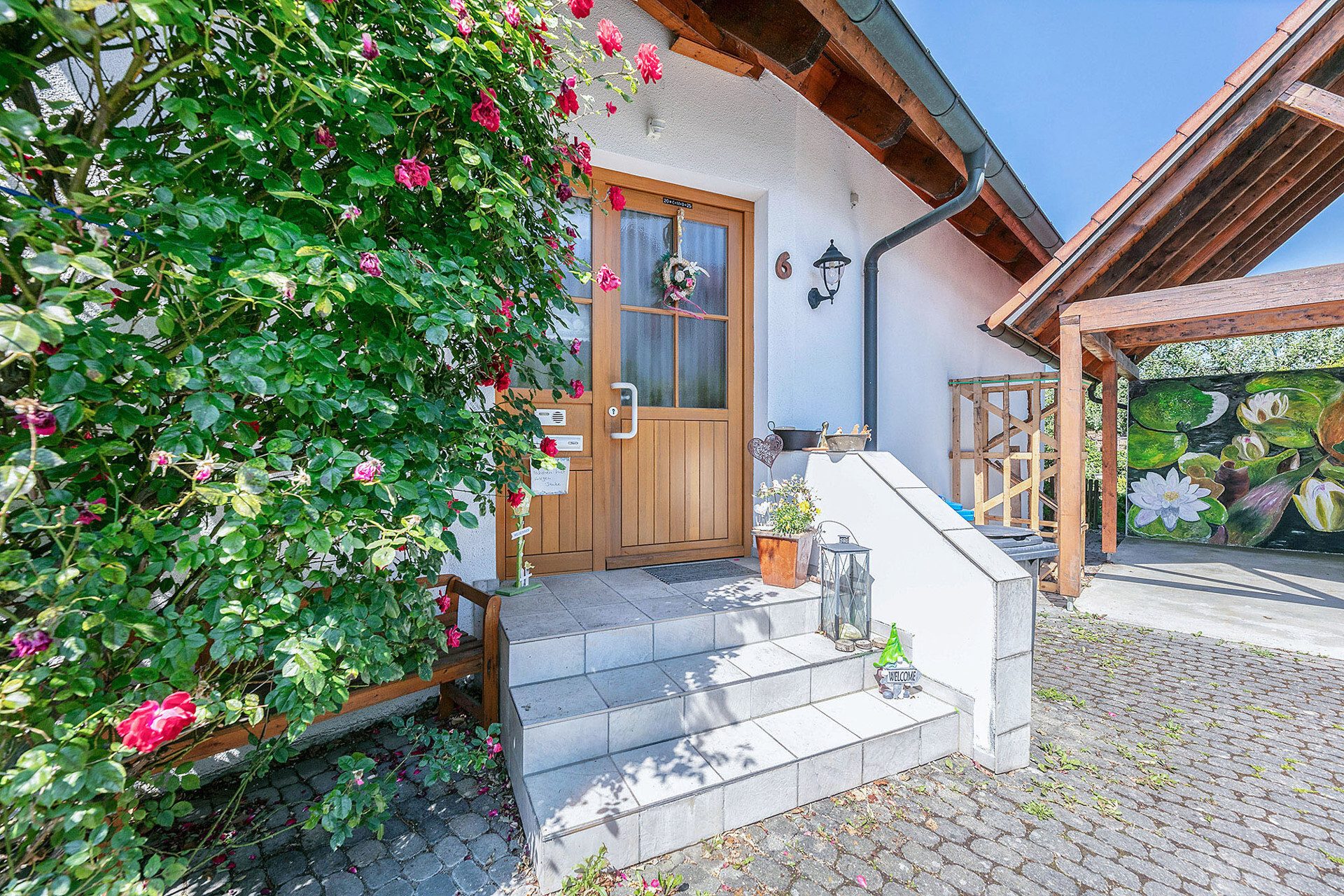 Titelbild Immobilienangebot - Ulm / Unterweiler - Alle - Modern & gemütlich: Vier Wände im Landhausstil, mit Garten und toller ELW