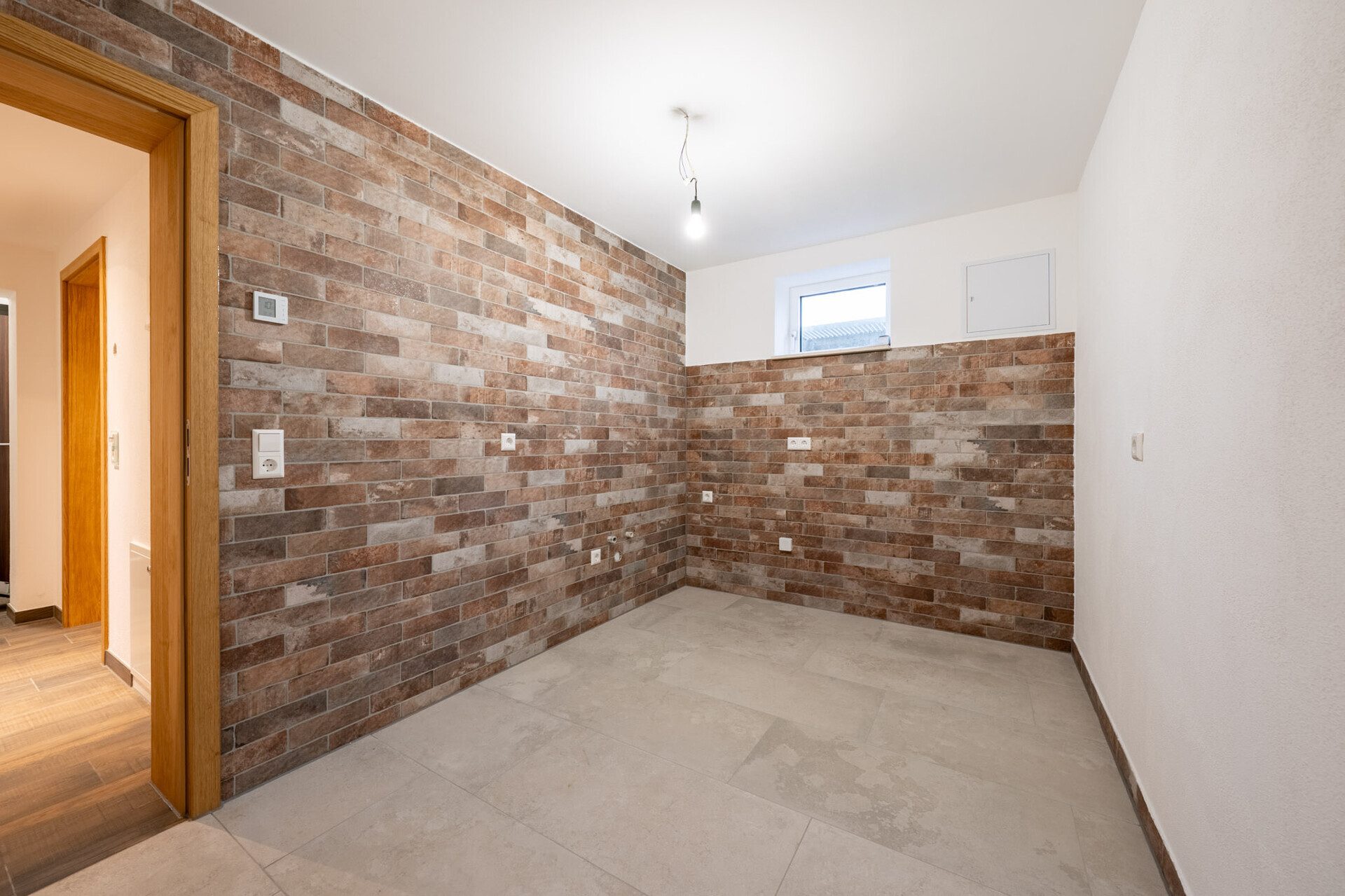 Immobilienangebot - Dornstadt - Alle - Gemütliches Wohnen mit Garten – 2-Zimmer-Souterrainwohnung
