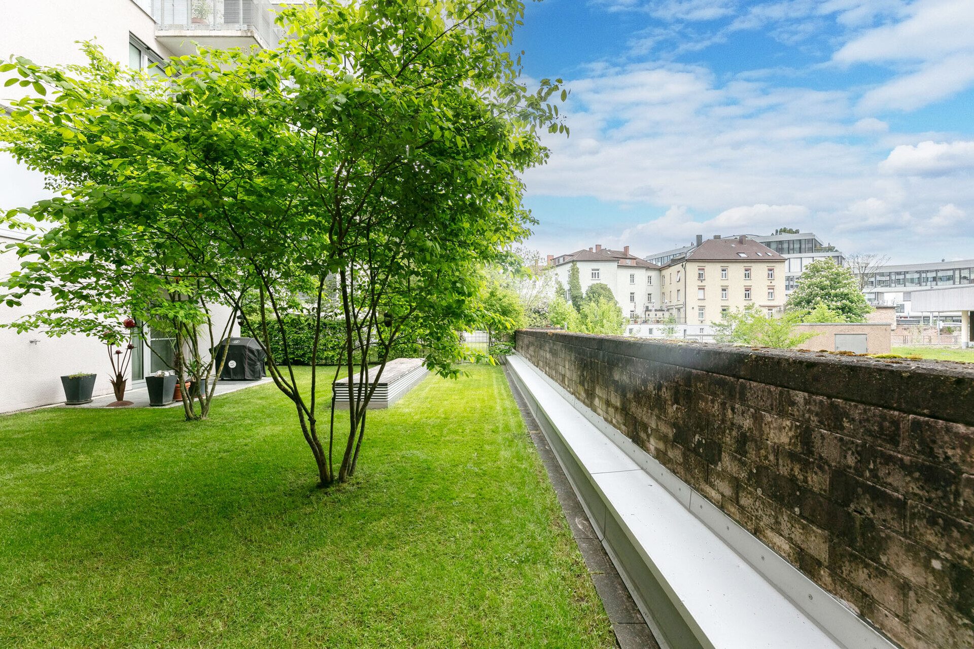 Immobilienangebot - Neu-Ulm - Alle - Wohnen an der Donau: 
Exklusive EG-Wohnung mit Gartenanteil