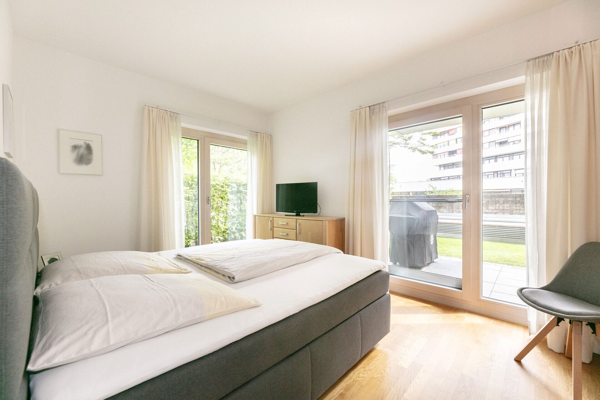 Immobilienangebot - Neu-Ulm - Alle - Wohnen an der Donau: 
Exklusive EG-Wohnung mit Gartenanteil