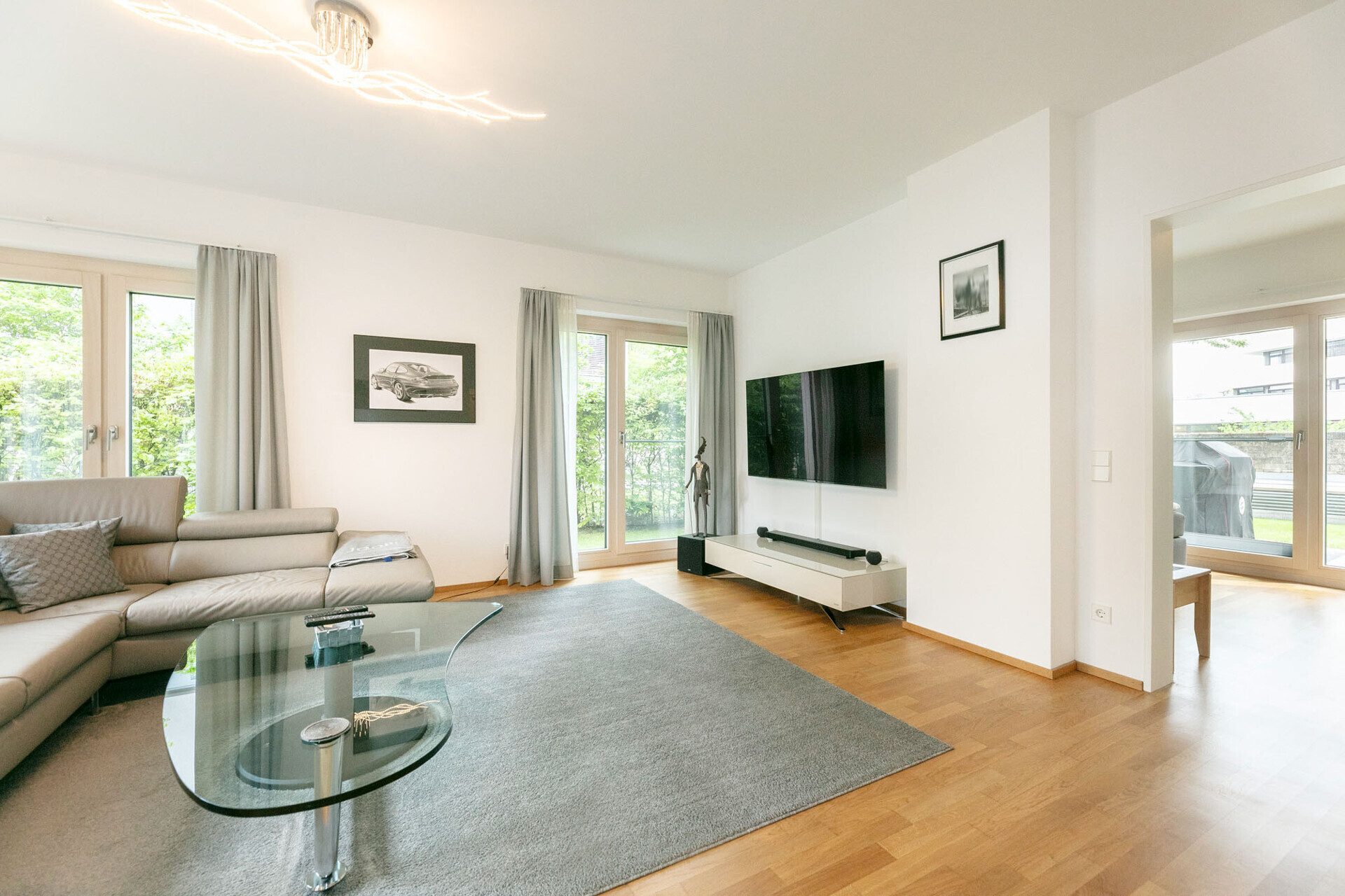 Immobilienangebot - Neu-Ulm - Alle - Wohnen an der Donau: 
Exklusive EG-Wohnung mit Gartenanteil