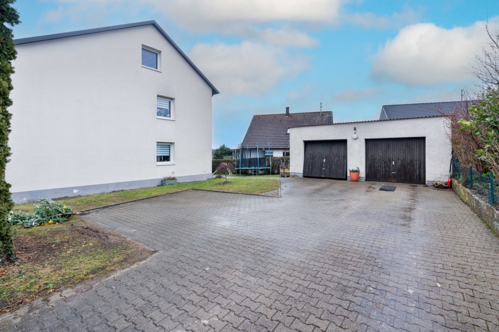 Hirn Immobilien GmbH - Immobilienangebot - Achstetten / Stetten - Häuser - Zweifamilienhaus in Achstetten – Vollvermietete Kapitalanlage mit 2 Wohneinheiten