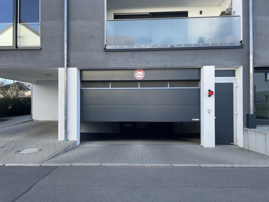 Hirn Immobilien GmbH - Immobilienangebot - Illerkirchberg - Alle - Großzügiger Tiefgaragenstellplatz zentral in Illerkirchberg