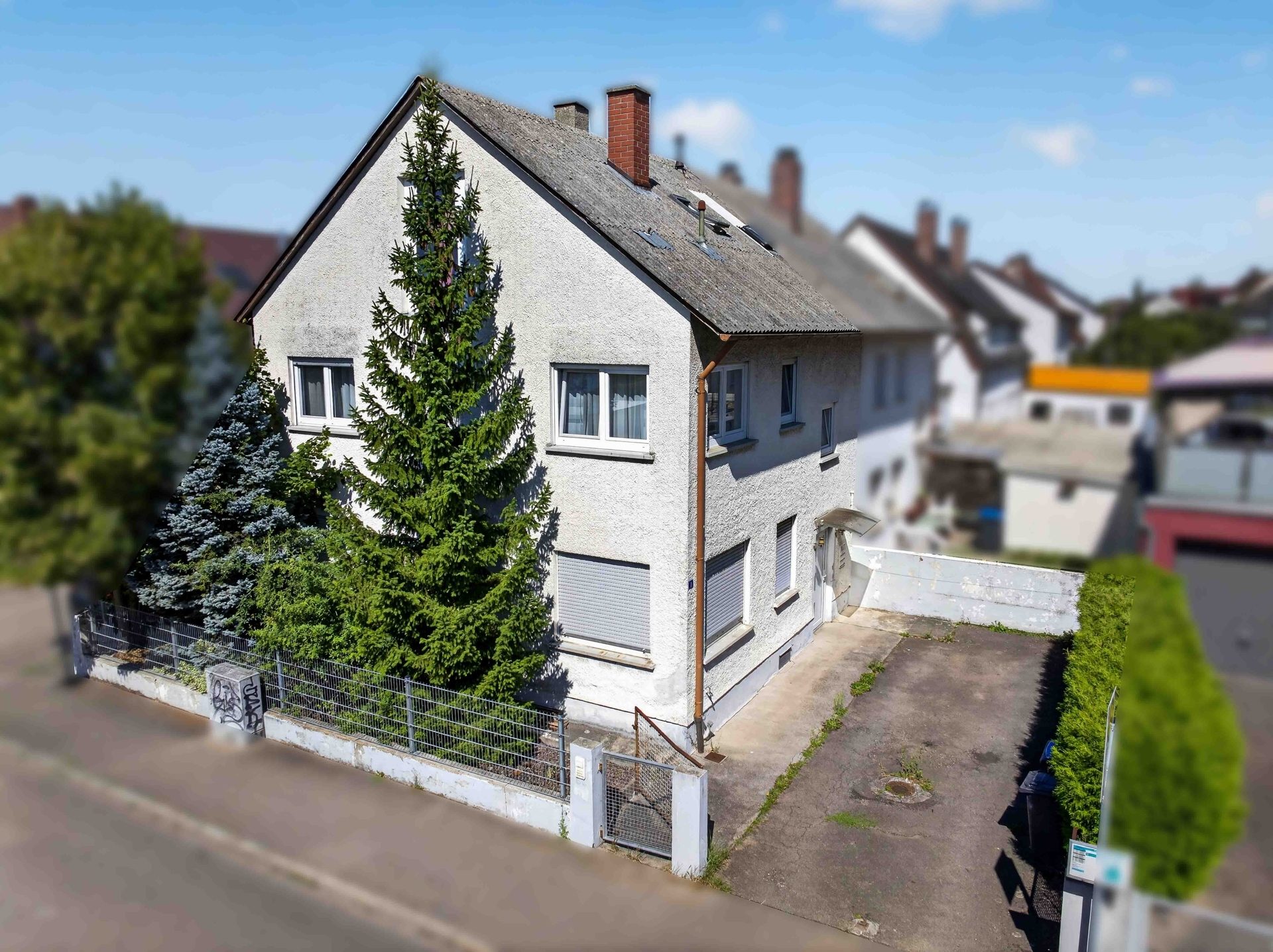 Hirn Immobilien GmbH - Immobilienangebot - Neu-Ulm / Offenhausen - Häuser - Vermietetes Dreiparteienhaus in Neu-Ulm/Offenhausen – Attraktive Kapitalanlage mit Mieteinnahmen