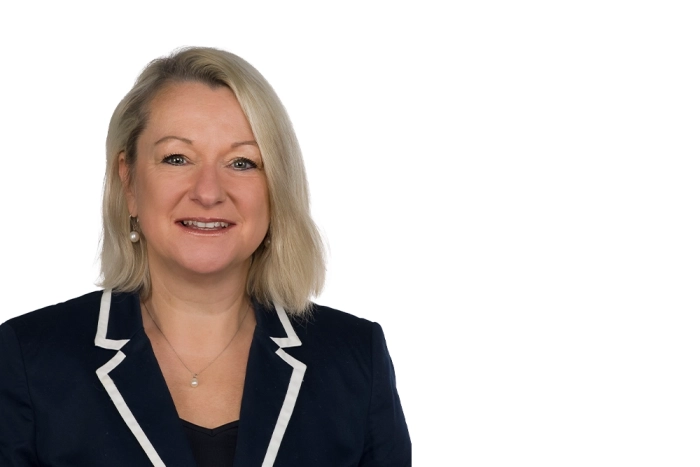 Porträt von Manja Kindlbacher, Immobilienmaklerin bei Orange Immobilienagentur